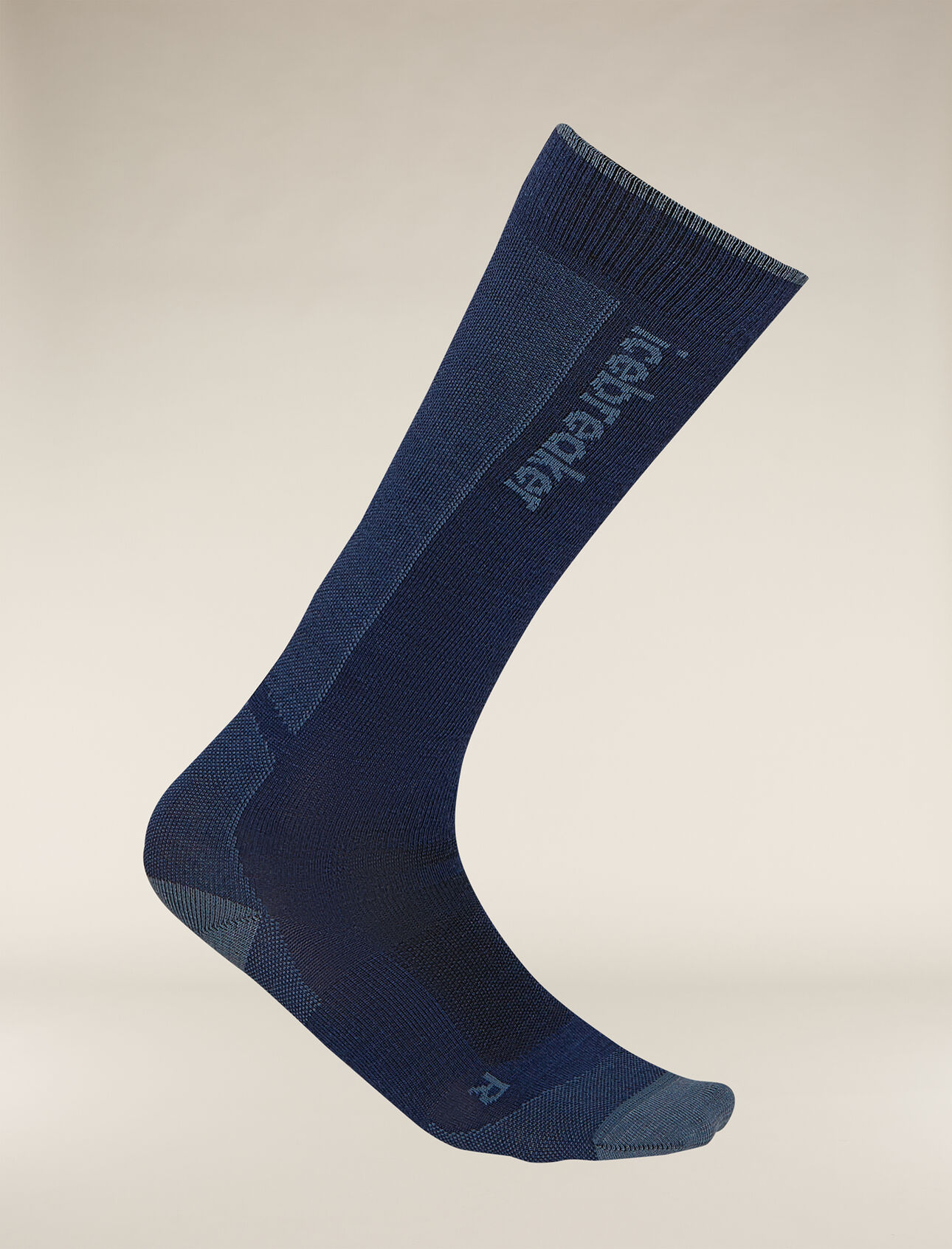 Mens Merino Ski+ Ultralight Over The Calf Socks Minimally cushioned ski socks for skiing the resort or the backcountry, the Merino Ski+ Ultralight Over the Calf socks are made with a durable, breathable merino wool blend.