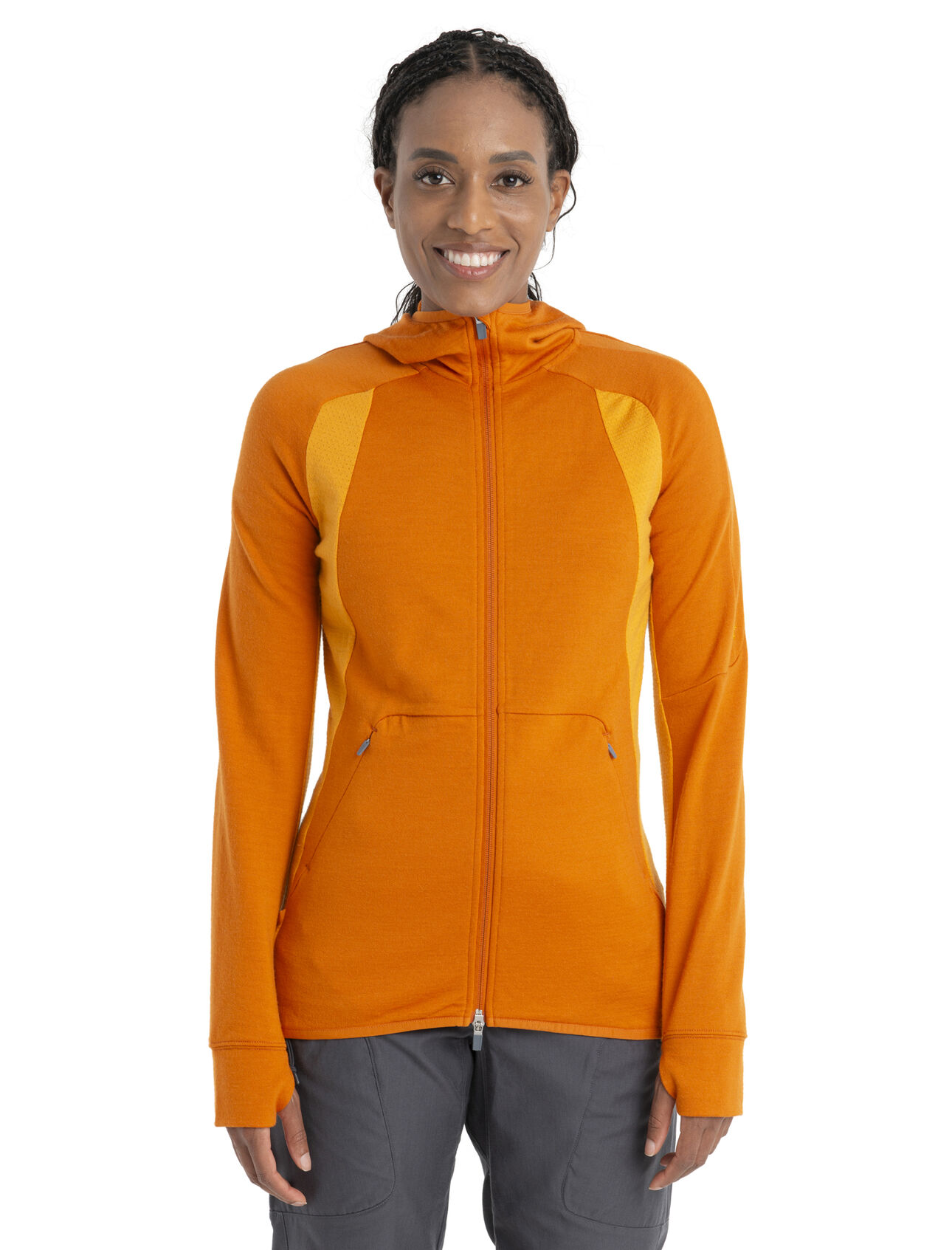 Womens ZoneKnit™ Merino Long Sleeve Zip Hoodie A midweight hoodie designed to balance warmth and breathability while on the move, the ZoneKnit™ Long Sleeve Zip Hood combines our 100% Merino fabric with strategic panels of eyelet mesh for enhanced airflow.