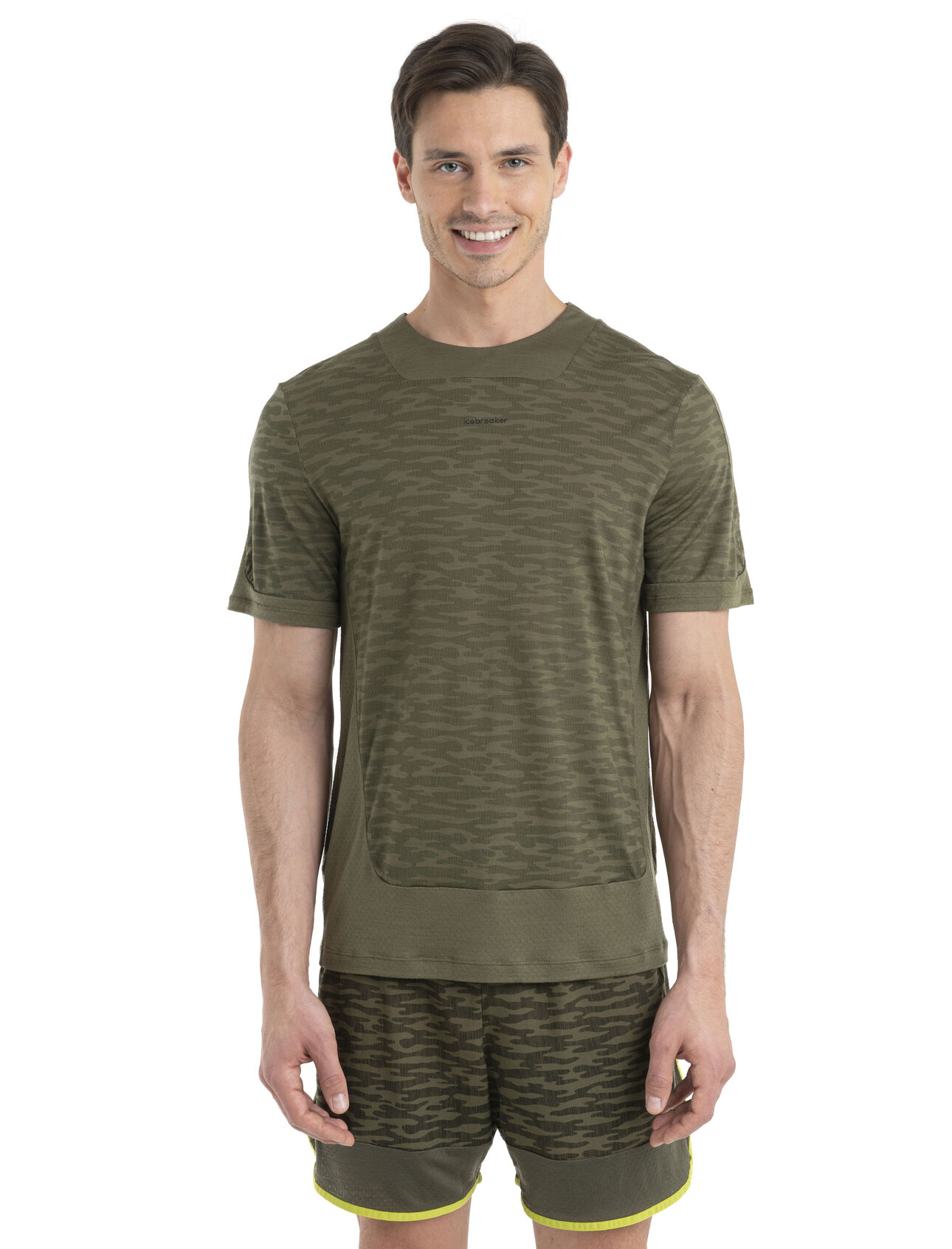 Mens 125 ZoneKnit™ Merino Short Sleeve T-Shirt IB Topo Our most breathable and lightweight tee designed for running, biking and other high exertion pursuits, the 125 ZoneKnit™ Short Sleeve Tee IB Topo combines our Cool-Lite™ jersey fabric with strategic panels of eyelet mesh for enhanced airflow. The natural camo print adds a high-performance feel.