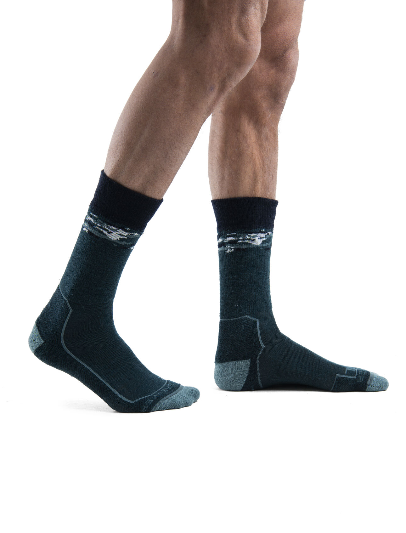 Mens Merino Hike+ Medium Crew Socks Sedimentary Durable, crew-length merino wool socks that are stretchy, breathable, and naturally odor-resistant with full cushion, the Hike+ Medium Crew Sedimentary socks feature an anatomical sculpted design for day hikes and backpacking trips.