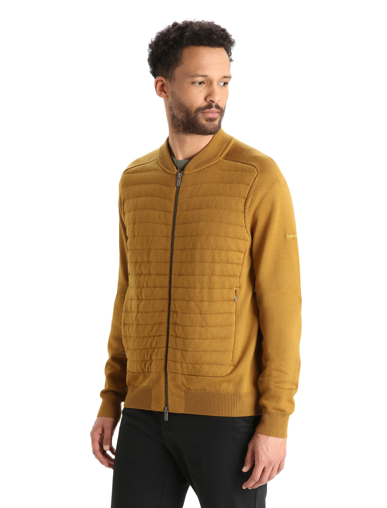 Mens icebreaker City Label ZoneKnit™ Merino Insulated Knit Bomber A reimagining of the classic bomber-style jacket that harnesses the natural benefits of merino wool, the icebreaker City Label ZoneKnit™Insulated Knit Bomber is a modern essential for everyday comfort.