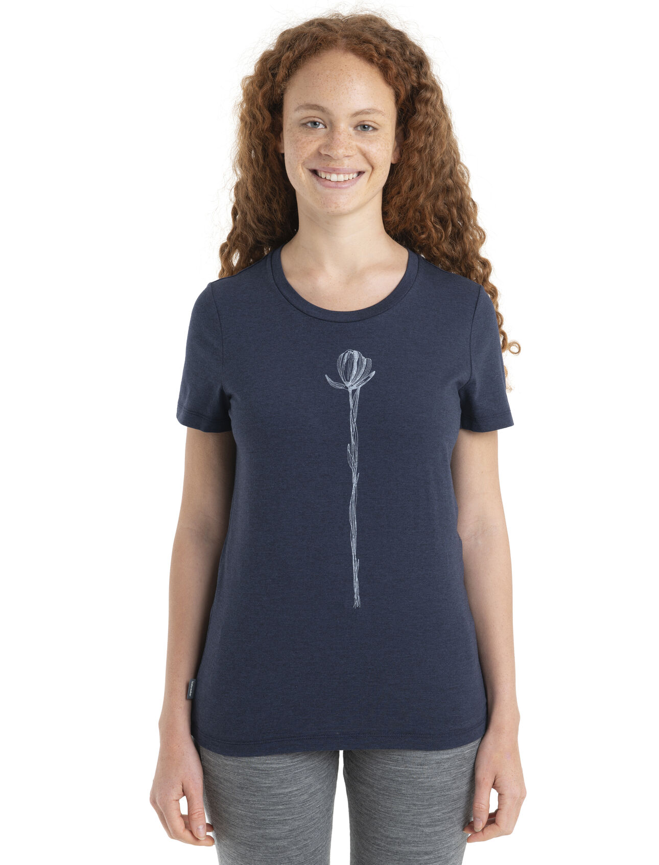 Womens Merino Central Classic Short Sleeve T-Shirt Solo Central to your wardrobe and as classic as they come, the Central Classic Short Sleeve Tee Solo is a go-to tee featuring a soft jersey blend of merino wool and organic cotton. The original artwork features a solitary flower from root to bloom. 