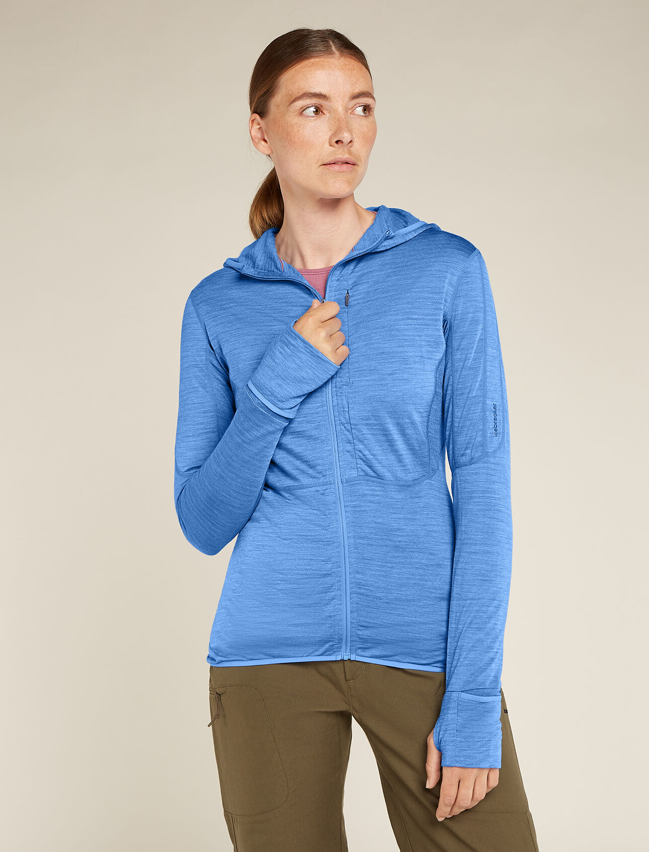Womens Merino Blend 200 Realfleece™ Descender Long Sleeve Zip Hoodie A lightweight and versatile merino-blend mid layer ideal for high-intensity pursuits in cool to cold conditions, the Merino Blend 200 Realfleece™ Descender Long Sleeve Zip Hoodie features underarm panels of Cool-Lite™ mesh for optimal ventilation.