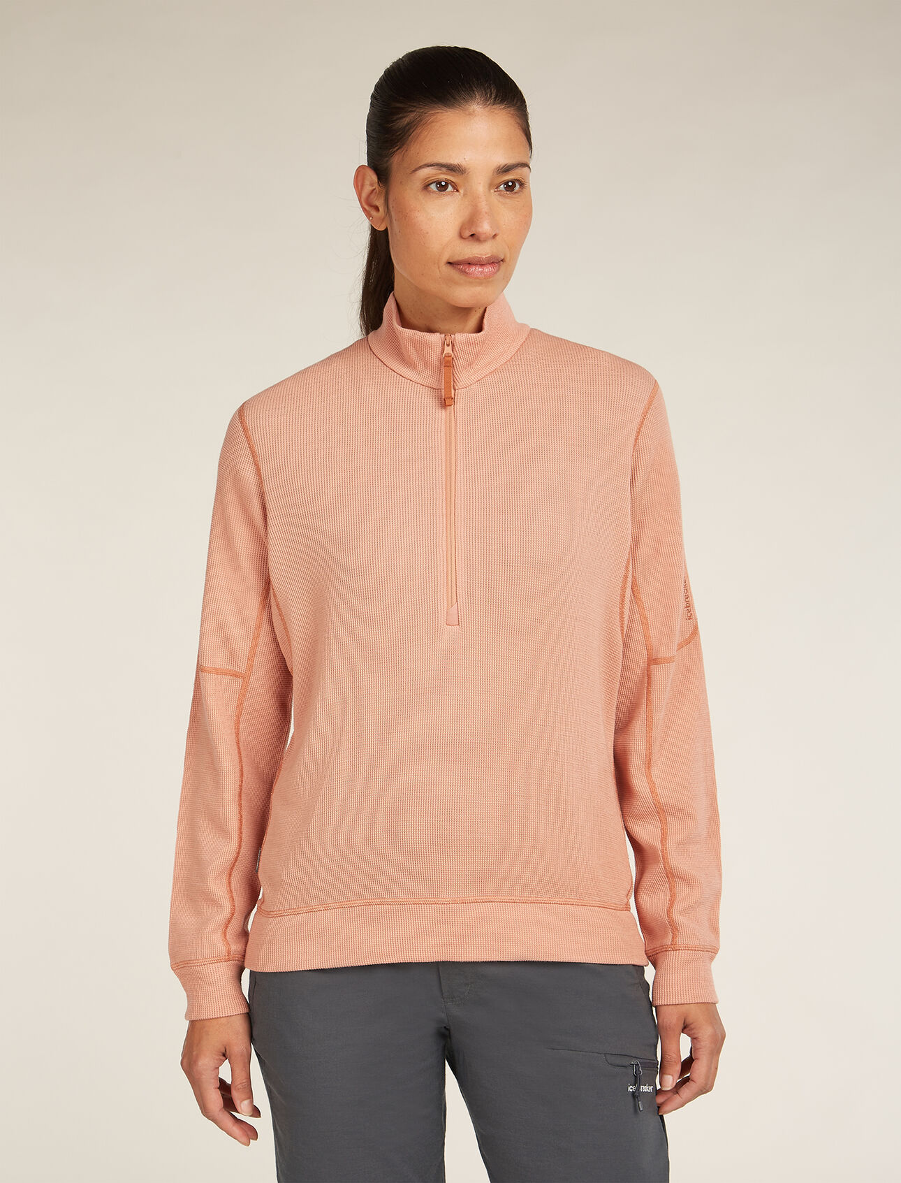 Womens Merino 260 Waffle Knit Wander Long Sleeve Half Zip Top A versatile top for before and after your outdoor adventures, the Merino 260 Waffle Knit Wander Long Sleeve Half Zip features a soft blend of merino wool fibre and TENCEL™ Lyocell for go-anywhere comfort. 
