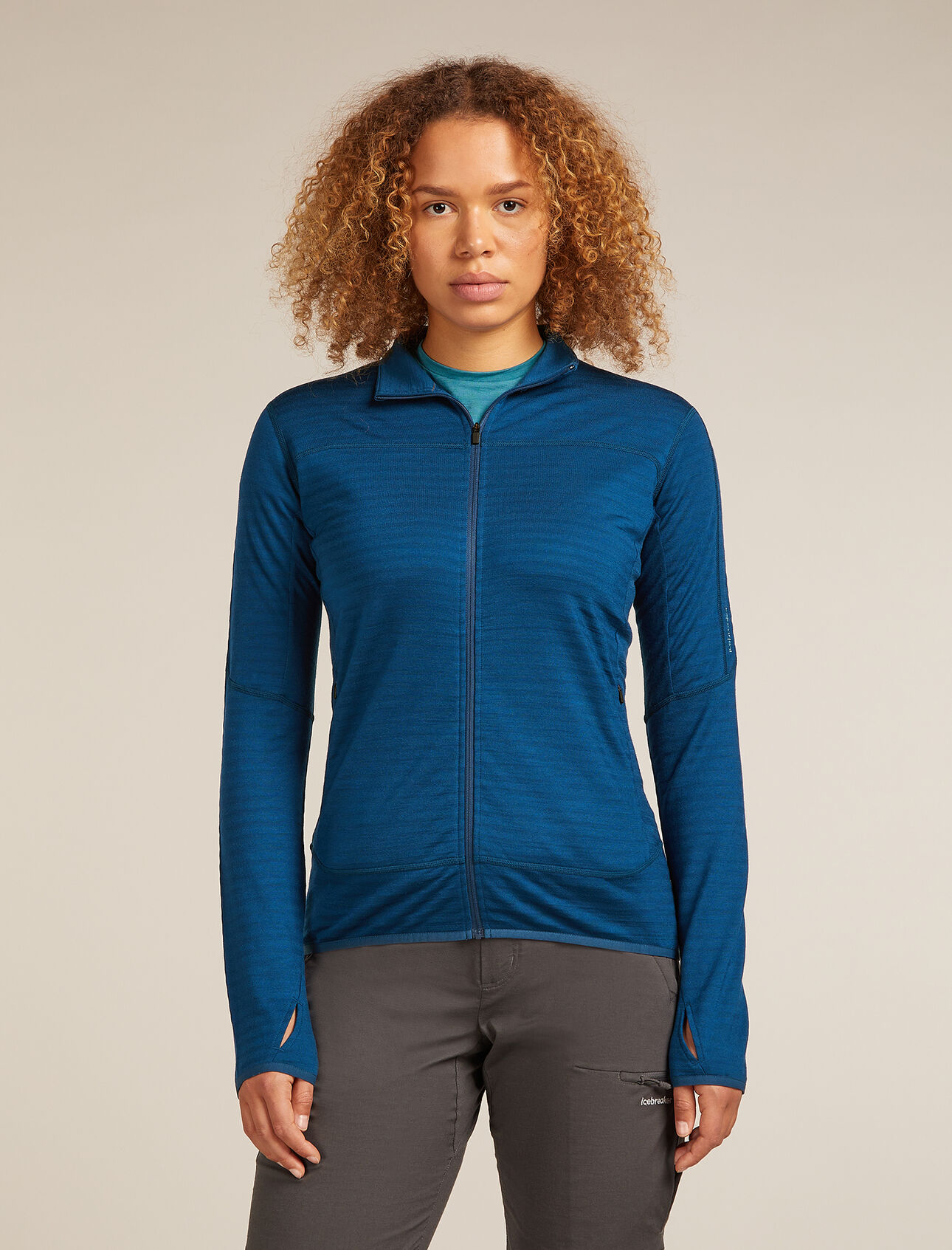 Womens Merino Blend 300 RealFleece™ Descender Long Sleeve Zip Jacket Perfect for performance activities like running and hiking in cold conditions, the Merino Blend 300 RealFleece™ Descender Long Sleeve Zip is the most versatile piece in the Descender line, featuring our innovative RealFleece™ blend of merino wool and TENCEL™Lyocell.
