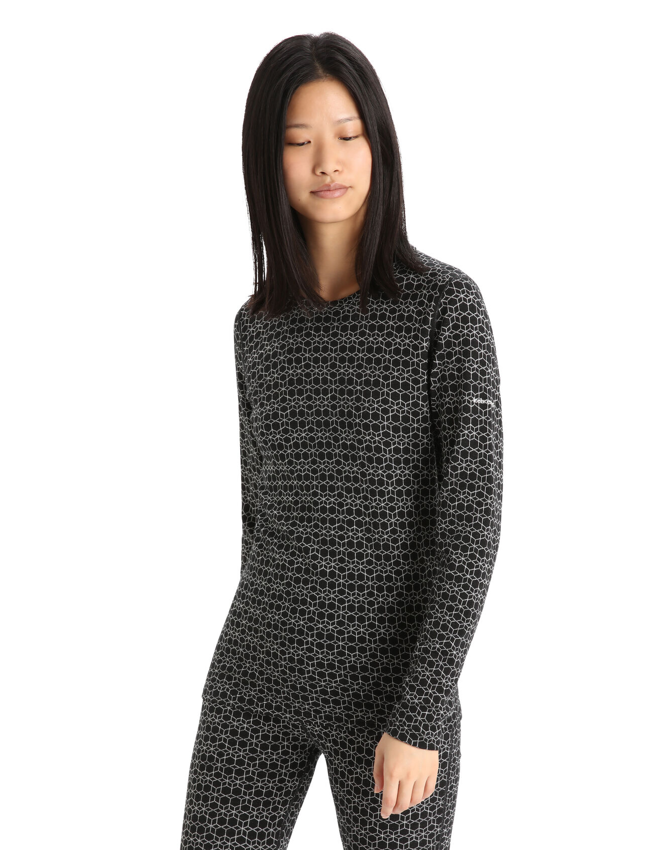 Womens Merino 250 Vertex Long Sleeve Crewe Thermal Top Alpine Geo An incredibly warm merino base layer with a unique jacquard pattern, the 250 Vertex Long Sleeve Crewe Alpine Geo is a go-to piece for winter layering—ideal for skiing, snowshoeing and other cold-weather pursuits. The all-over graphic print draws inspiration from the fractal structure of a snowflake.