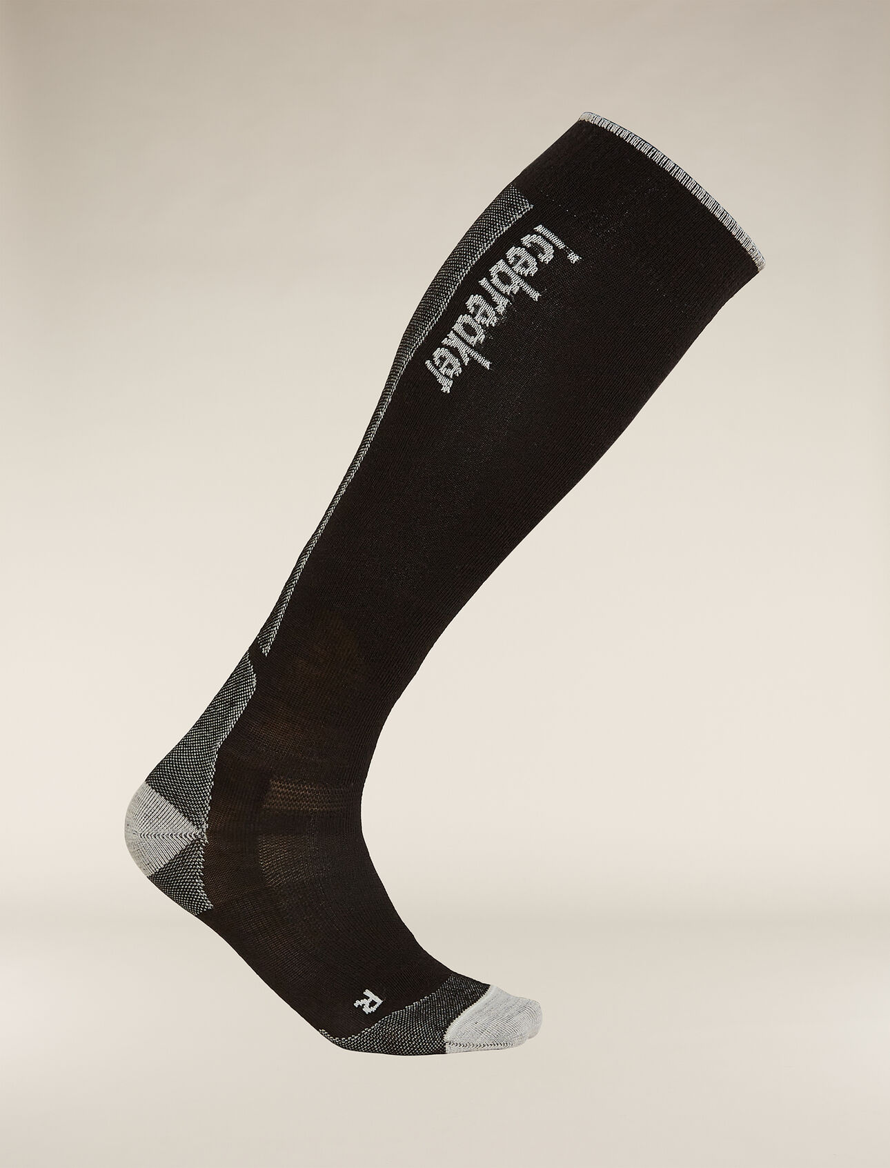 Mens Merino Ski+ Ultralight Over The Calf Socks Minimally cushioned ski socks for skiing the resort or the backcountry, the Merino Ski+ Ultralight Over the Calf socks are made with a durable, breathable merino wool blend.