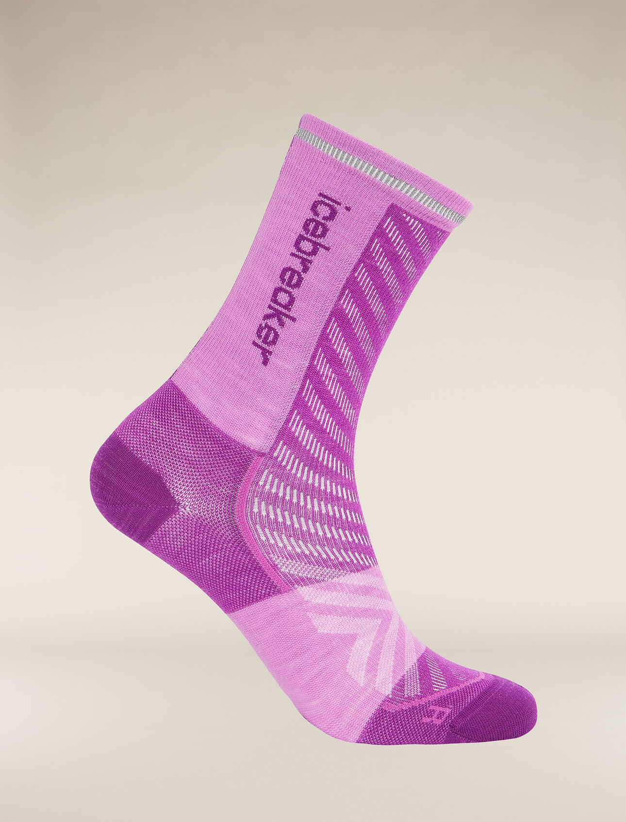 Womens Merino Blend Run+ Ultralight Crew Socks Thin, ultralight running socks made with a technical merino wool blend and crew height, the Merino Run+ Ultralight Crew is perfect for runs of any length. A reflective stripe on the back helps keep you visible in low-light conditions.