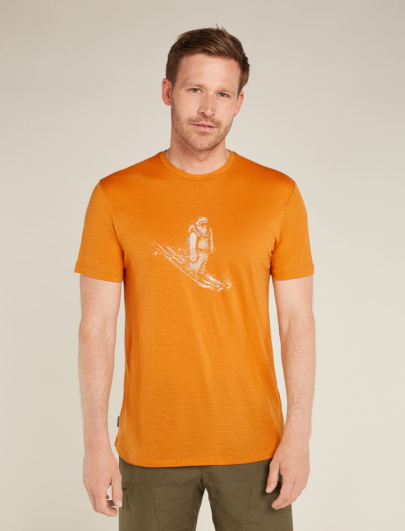 Mens Merino 150 Tech Lite Short Sleeve T-Shirt Skiing Yeti Our most versatile tech tee that provides comfort, breathability and odour-resistance for four seasons worth of adventure, the Merino 150 Tech Lite Short Sleeve Tee Skiing Yeti features 100% merino for all-natural performance. The original artwork by Damon Watters features a fun illustration of the ultimate mountain dweller enjoying some turns. 