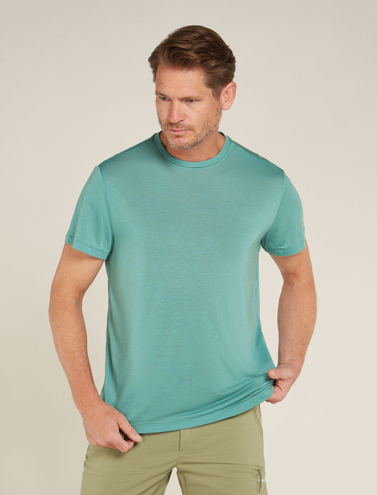 Mens Merino Blend Core Short Sleeve T-Shirt A streamlined, classic-fit T-shirt made with a blend of sustainable TENCEL™ and natural merino wool, the Merino Core Short Sleeve Tee offers optimal breathability, comfort and odour resistance for everyday adventures.
