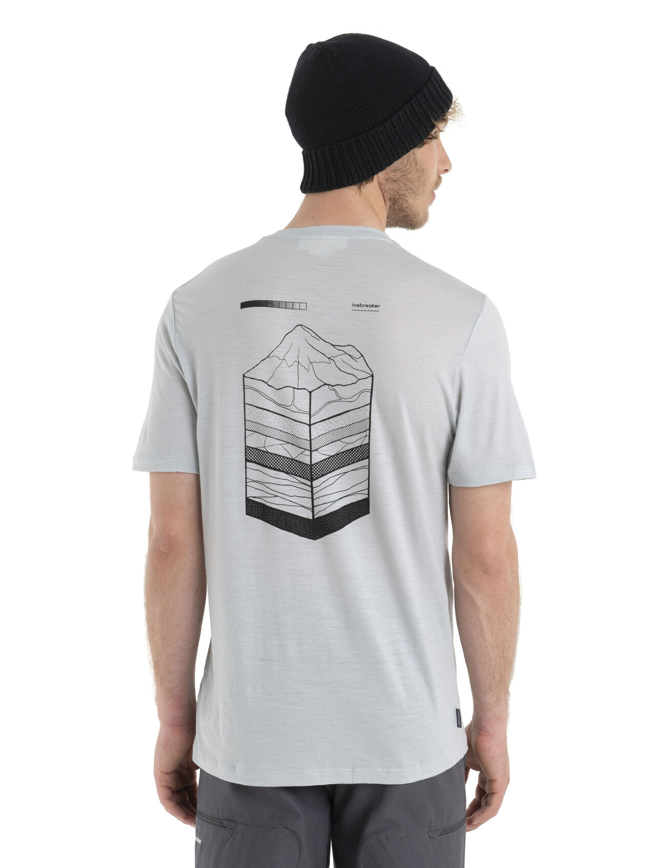 Mens Merino 150 Tech Lite II Short Sleeve T-Shirt Mountain Layers Our versatile tech tee that provides comfort, breathability and odour-resistance for any adventure you can think of, the 150 Tech Lite II Short Sleeve Tee Mountain Layers features 100% merino for all-natural performance. The tee's original artwork draws inspiration from the dormant volcano Mount Taranaki on New Zealand's North Island, showing the layers of the earth beneath the mountain. 