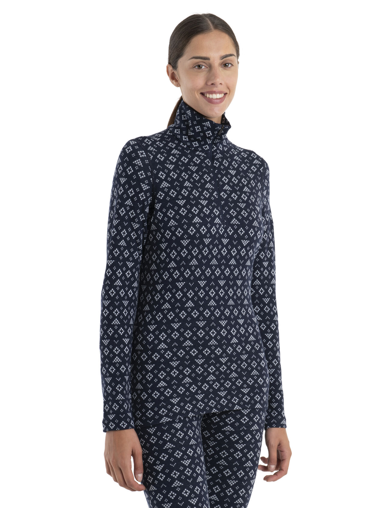 Womens Merino 260 Vertex Long Sleeve Half Zip Thermal Top First Snow An incredibly warm merino base layer with a unique jacquard pattern, the 260 Vertex Long Sleeve Half Zip First Snow is a go-to piece for winter layering—ideal for skiing, snowshoeing and other cold-weather pursuits. The all-over graphic print draws inspiration from the fractal structure of a snowflake.