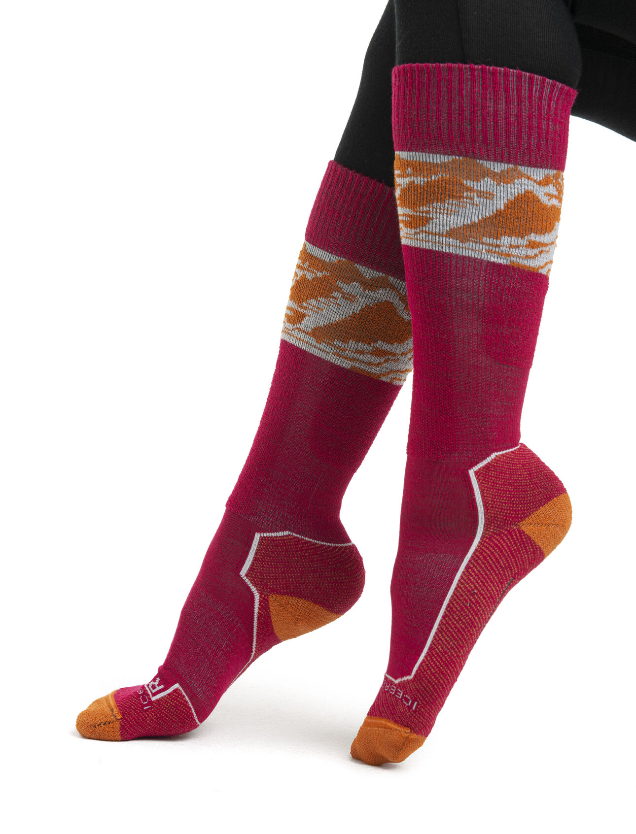 Womens Merino Ski+ Light Over the Calf Alps 3D Lightly cushioned ski socks for skiing the resort or the backcountry, the Ski+ Light Over the Calf Alps 3D socks are made with a durable, breathable merino wool blend.
