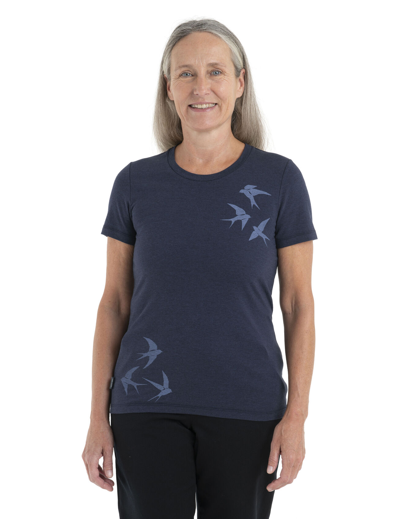 Womens Merino Central Classic Short Sleeve T-Shirt Swarming Shapes Central to your wardrobe and as classic as they come, the Central Classic Short Sleeve Tee Swarming Shapes is a go-to tee featuring a soft jersey blend of merino wool and organic cotton. The original artwork draws inspiration from the darting and swooping of a flock of birds.