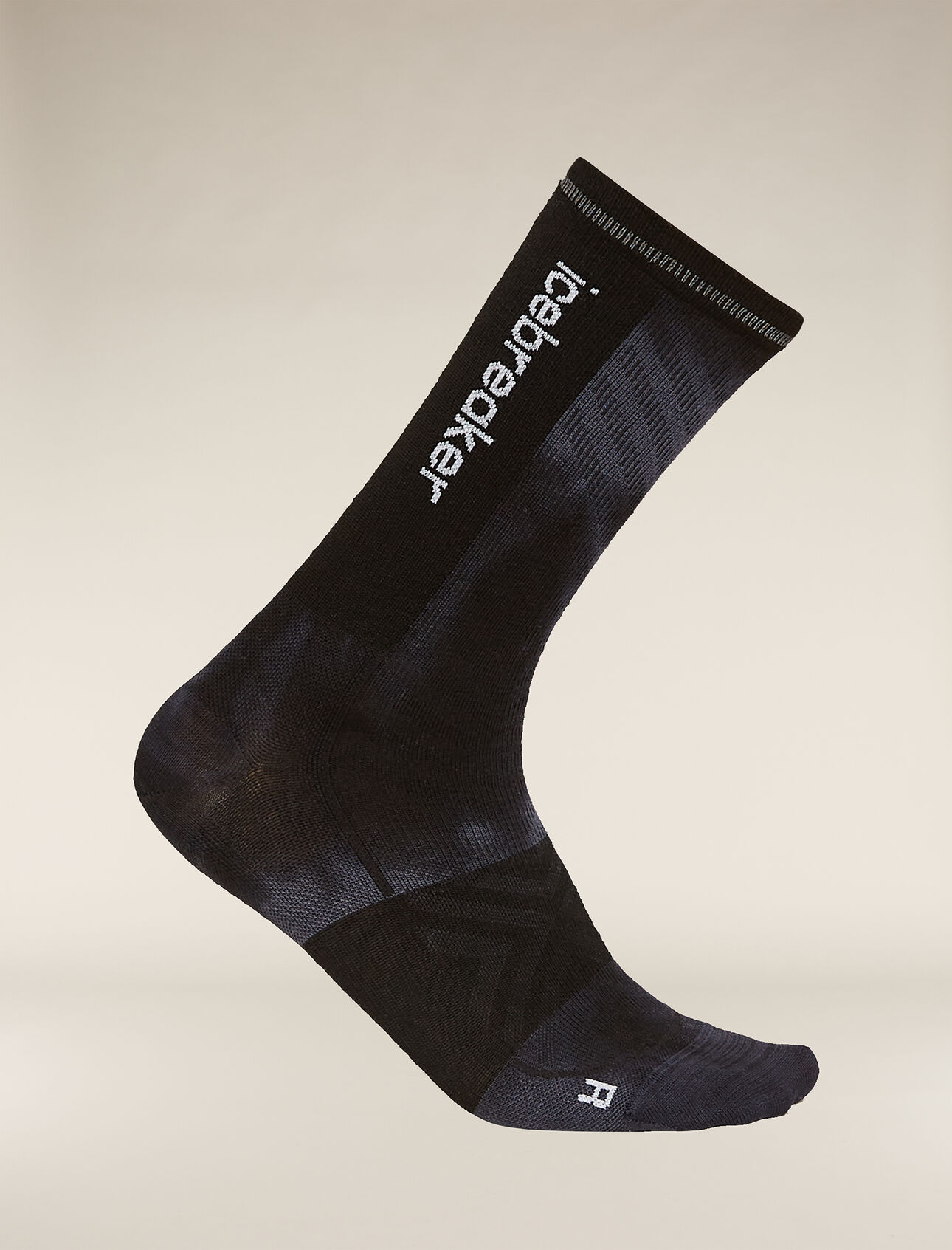 Womens Merino Blend Run+ Ultralight Crew Socks Cloud Dye Thin, ultralight running socks made with a technical merino wool blend and crew height, the Merino Blend Run+ Ultralight Crew Cloud Dye is perfect for runs of any length. A reflective stripe on the back helps keep you visible in low-light conditions. The all-over pattern draws inspiration from the earthy tonal patterns found in nature.