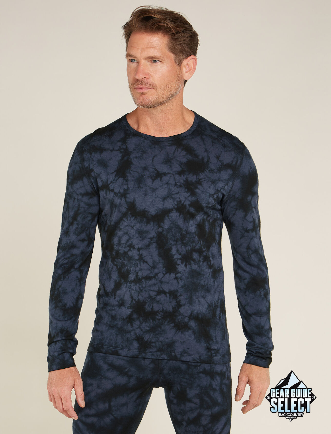 Mens Merino 200 Oasis Long Sleeve Crewe Thermal Top Cloud Dye The benchmark against which all others are judged, the Merino 200 Oasis Long Sleeve Crewe Cloud Dye features our most versatile merino wool jersey fabric for year-round layering performance across any activity. The all-over print draws inspiration from the earthy tonal patterns of natural light and shade.