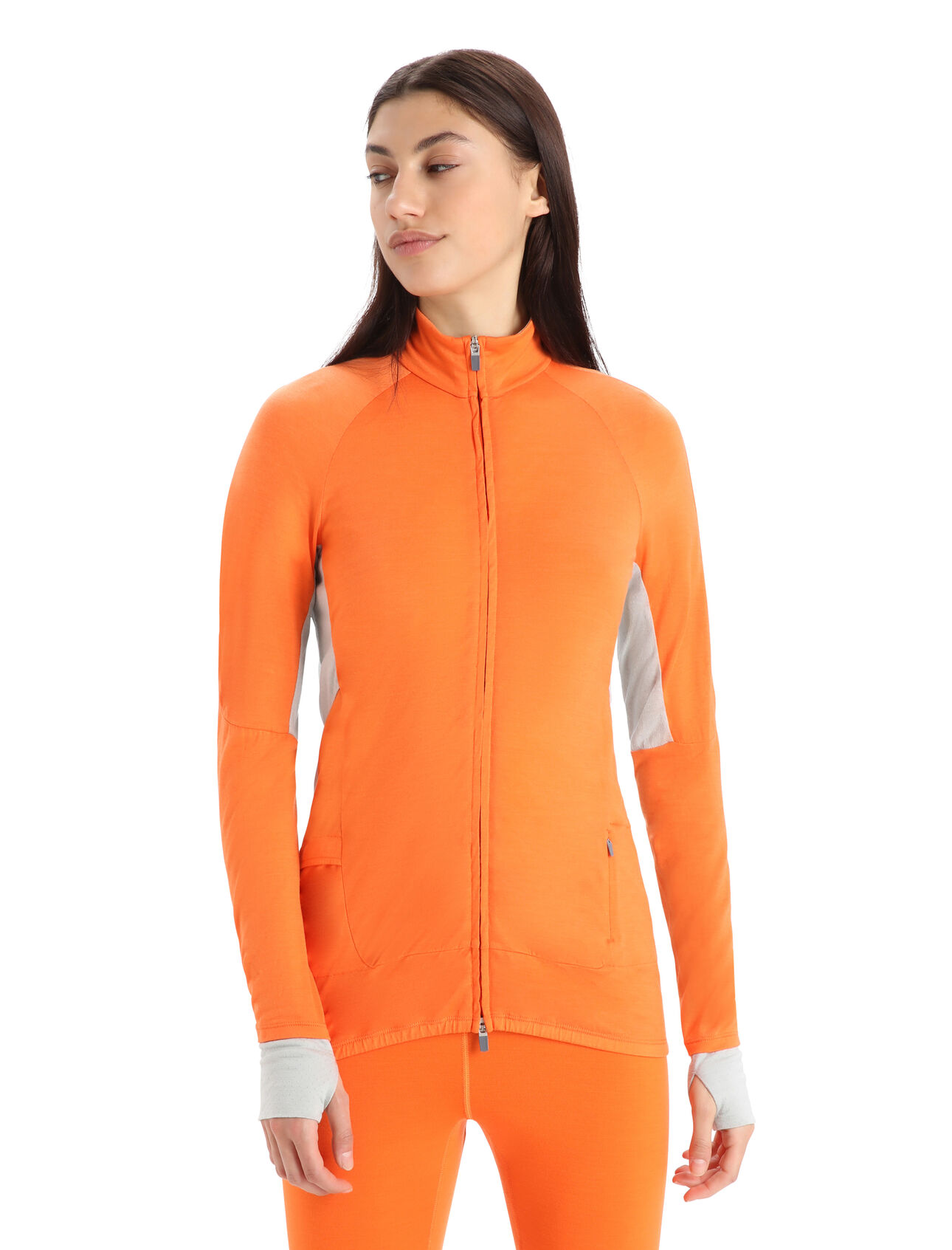 Womens ZoneKnit™ Merino Long Sleeve Zip Jacket A lightweight midlayer designed to balance warmth and breathability while running, biking or moving fast in the mountains, the ZoneKnit™ Long Sleeve Zip combines our Cool-Lite™ jersey fabric with strategic panels of eyelet mesh for enhanced airflow.