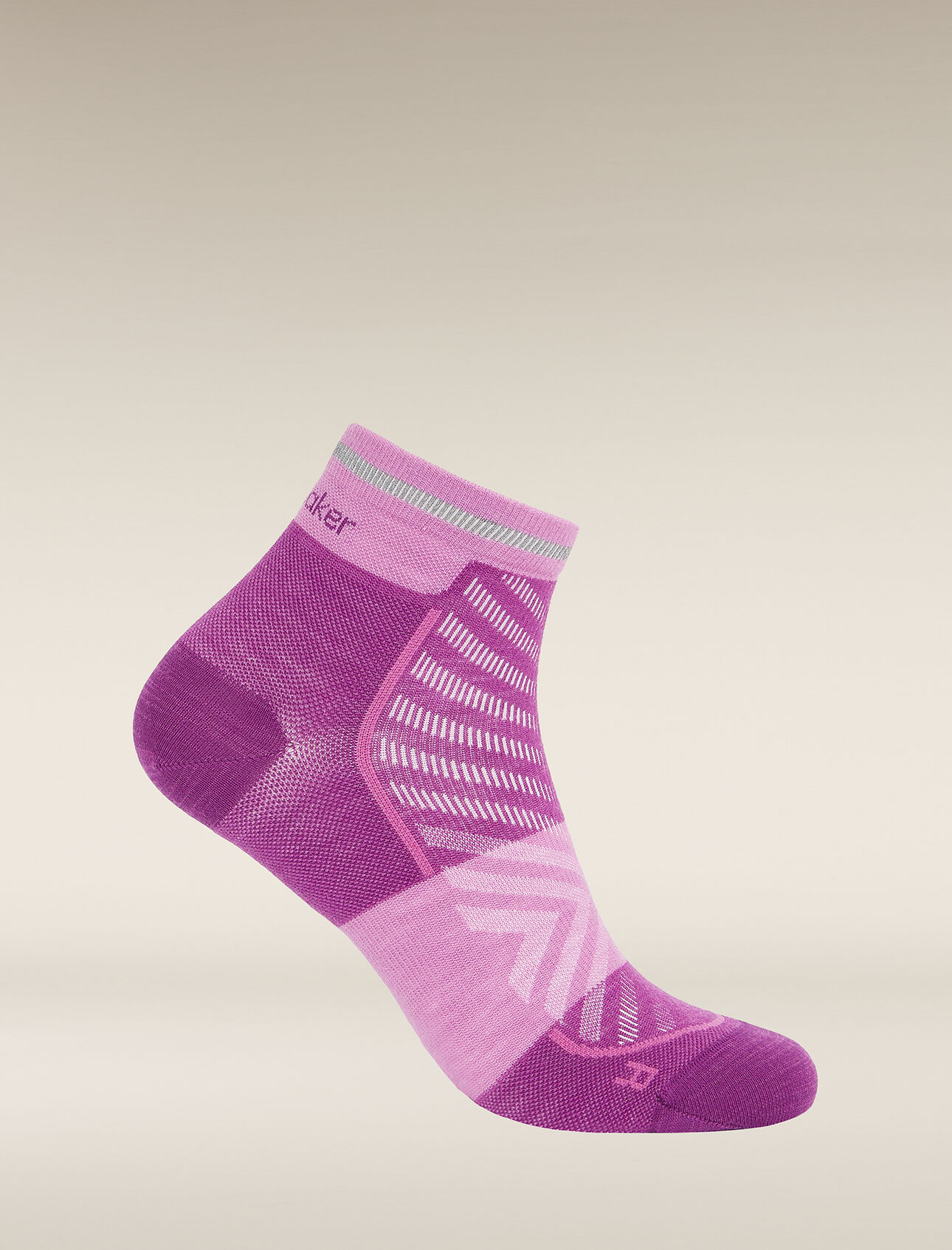 Womens Merino Blend Run+ Ultralight Mini Socks Thin, ultralight running socks made with a technical merino wool blend and low-cut height, the Merino Run+ Ultralight Mini is perfect for runs of any length. A reflective stripe on the back helps keep you visible in low-light conditions.