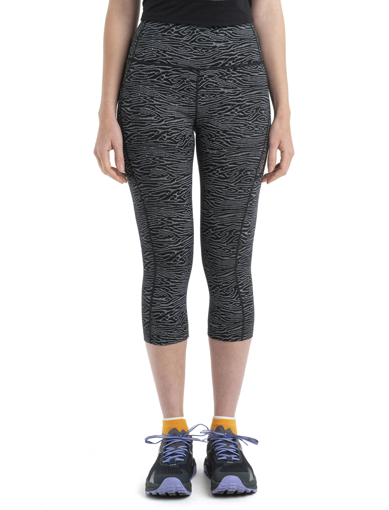 Womens Merino Fastray High Rise 3/4 Tights IB Topo Lines Functional, form-fitting bottoms for active performance on or off the trail, the Fastray High Rise 3/4 Tights Topo Lines feature a stretchy merino wool blend with a high waist for added coverage. The dynamic all-over print comes from a combination of topographic contour lines and animal prints. 