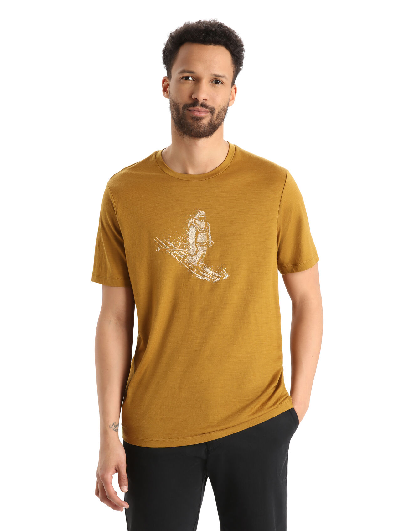 Mens Merino Tech Lite II Short Sleeve T-Shirt Skiing Yeti Our versatile tech tee that provides comfort, breathability and natural odor-resistance for any adventure you can think of, the Tech Lite II Short Sleeve Tee Skiing Yeti features 100% merino for all-natural performance. The original artwork by Damon Watters features a fun illustration of the ultimate mountain dweller enjoying some turns.