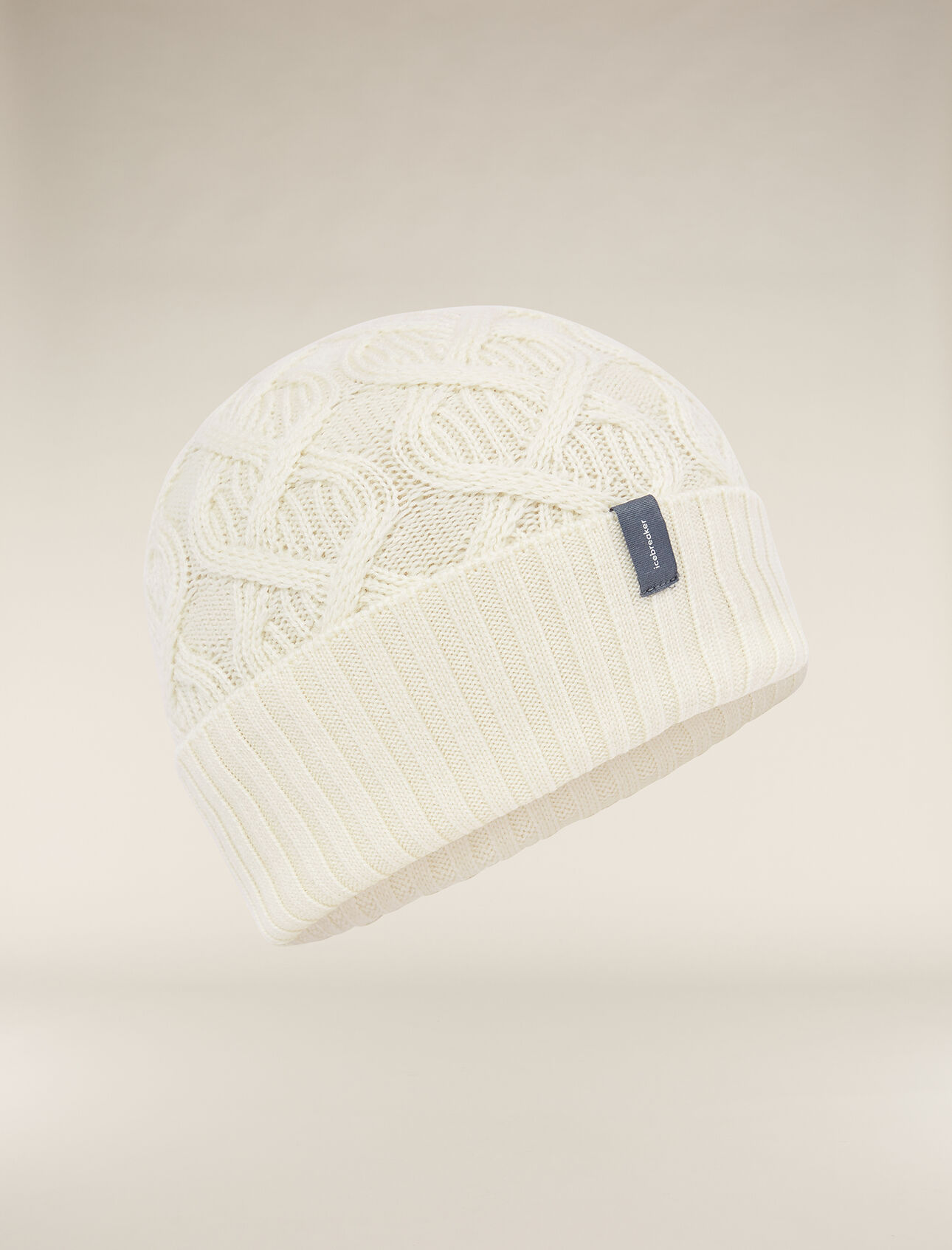 Merino Cable Knit Beanie Unisexe Bonnet doux, léger et fait d’un tricot torsadé en laine mérinos, le bonnet mérinos Cable Knit vous garde au chaud pendant les froides journées d’hiver. 