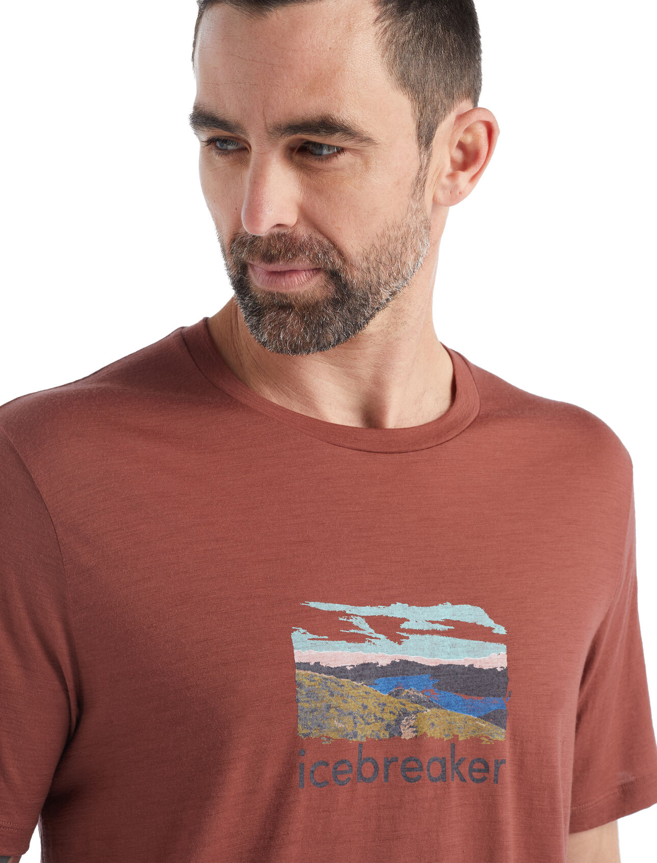 Mens Merino Tech Lite II Short Sleeve T-Shirt Trailhead Our versatile Tech Tee that provides comfort, breathability and odor-resistance for any adventure you can think of, the Tech Lite II Short Sleeve Tee Trailhead features 100% merino for all-natural performance. The original artwork features a retro-inspired print of a trail in Queenstown, New Zealand.