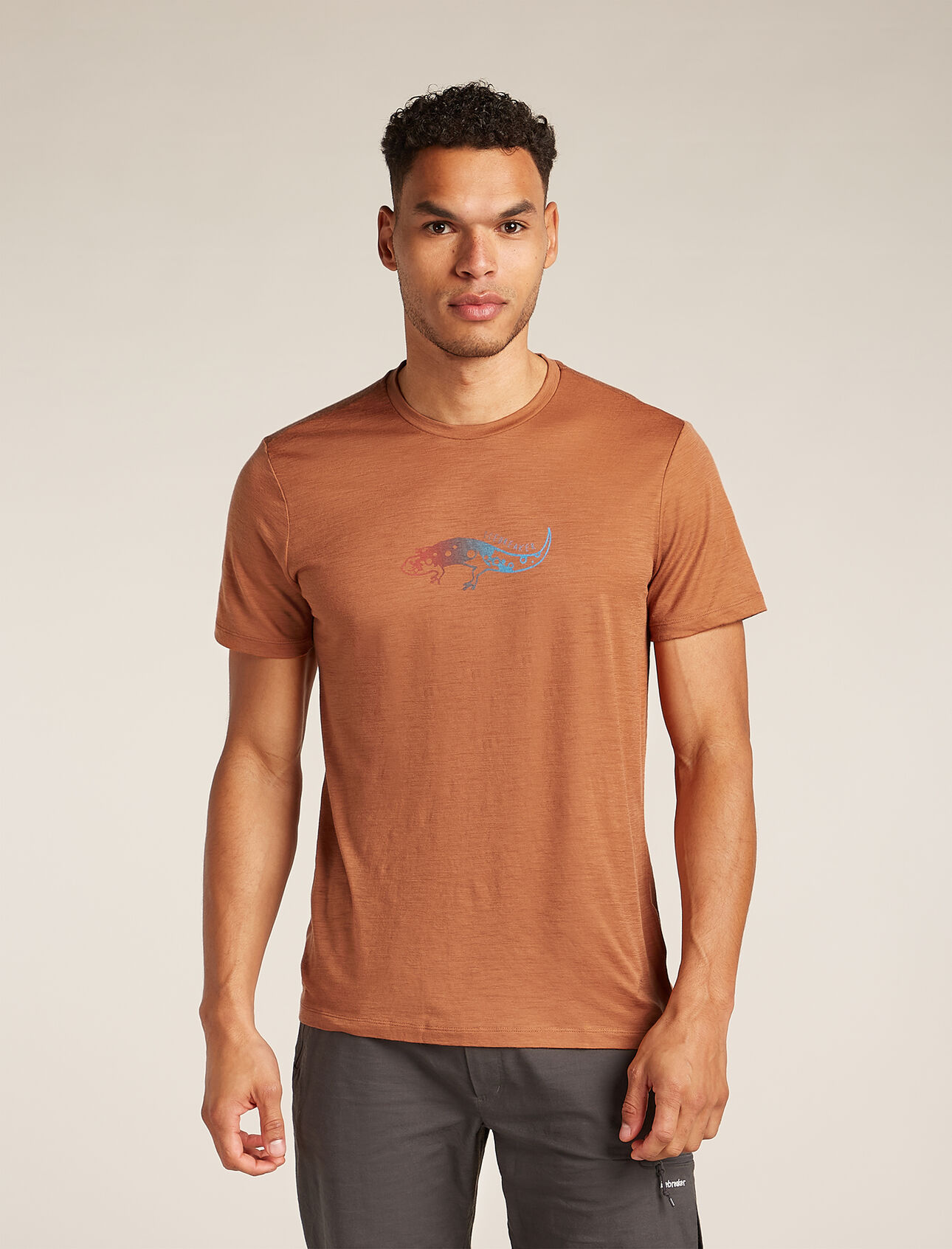 Mens Merino 150 Tech Lite Short Sleeve T-Shirt Slimey Salamander Our most versatile tech tee that provides comfort, breathability and odour-resistance for four seasons worth of adventure, the Merino 150 Tech Lite Short Sleeve Tee Slimey Salamander features 100% merino fabric for all-natural performance. The original graphic artwork features an illustration of a multi-colored salamander, often seen along damp hiking trails. 