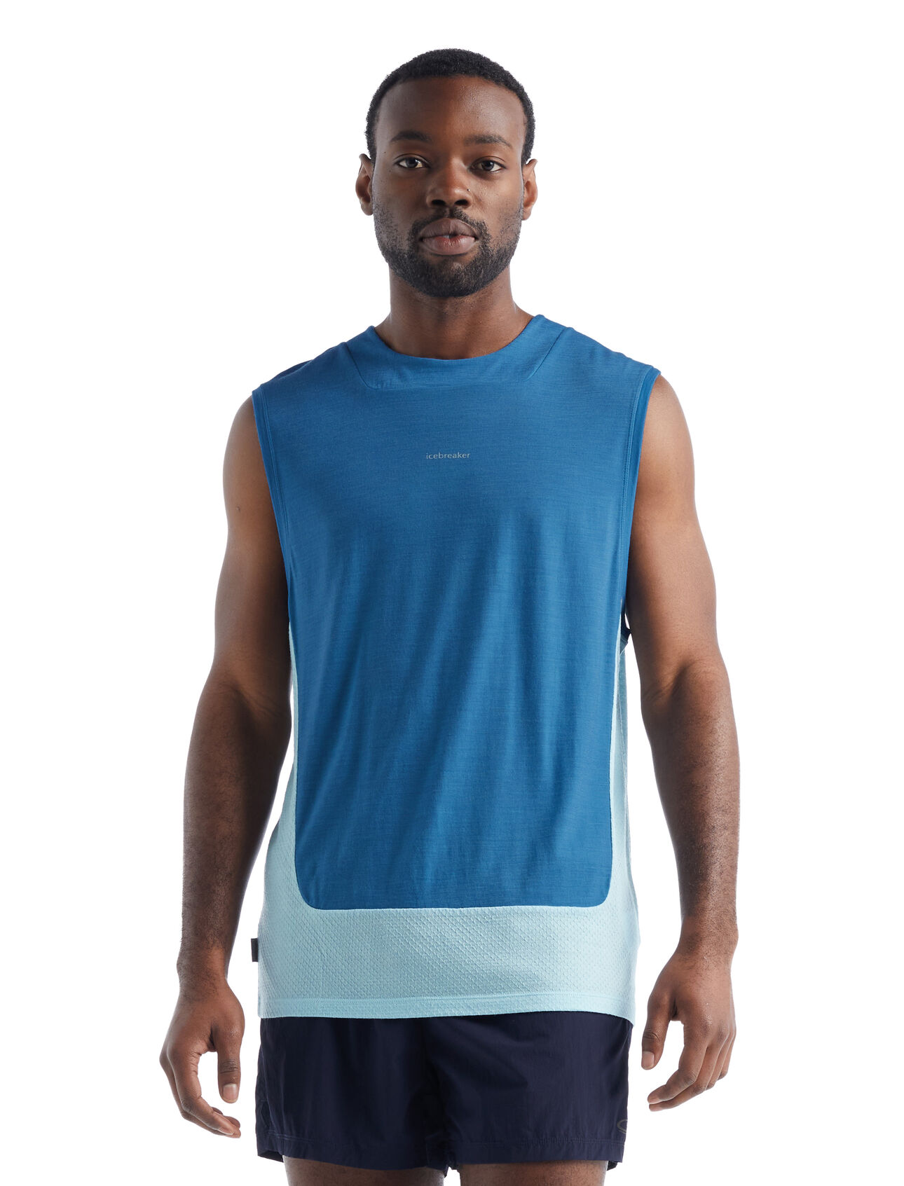 Mens ZoneKnit™ Merino Tank Our most breathable and lightweight tank designed for high-output adventures, the ZoneKnit™ Tank combines our Cool-Lite™ merino jersey fabric with eyelet mesh panels for exceptional breathability.