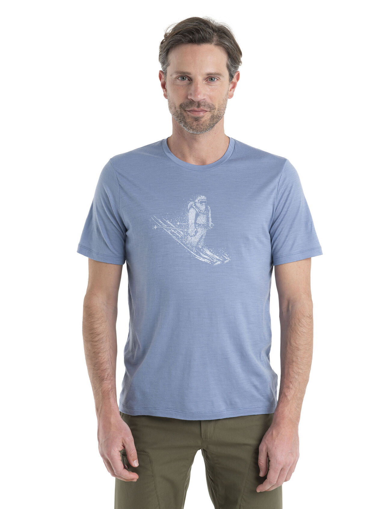 Mens Merino Tech Lite II Short Sleeve Tee Skiing Yeti Our versatile tech tee that provides comfort, breathability and natural odor-resistance for any adventure you can think of, the Tech Lite II Short Sleeve Tee Skiing Yeti features 100% merino for all-natural performance. The original artwork by Damon Watters features a fun illustration of the ultimate mountain dweller enjoying some turns.