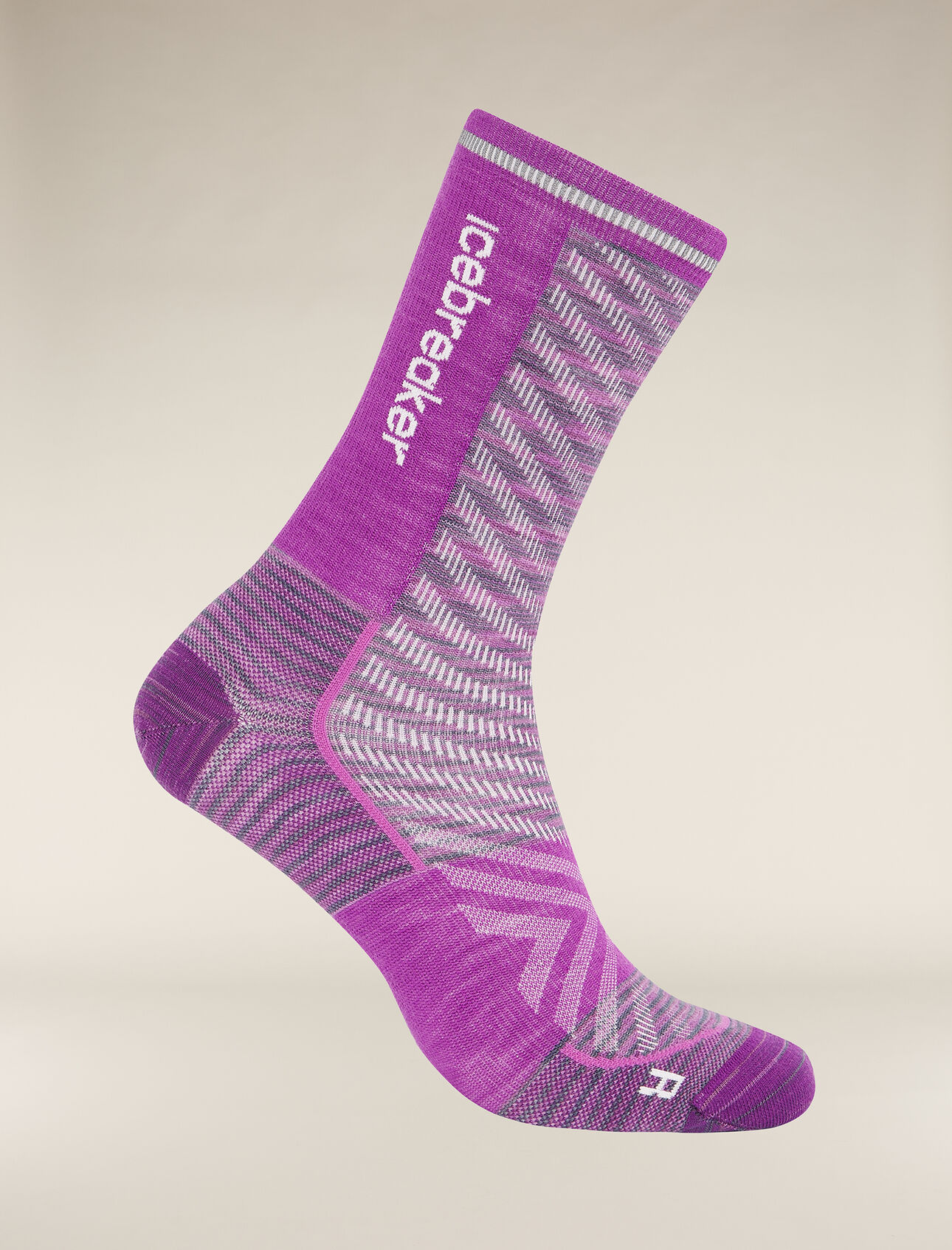 Womens Merino Blend Run+ Ultralight Crew Socks Fusion Dye Thin, ultralight running socks made with a technical merino wool blend and crew height, the Run+ Ultralight Crew Fusion Dye feature reflective details at the cuff. Inspired by the seasonal theme of FUSION, the graphic explores the dynamism of wordly forces, the energy of nature and the power of running the trail.